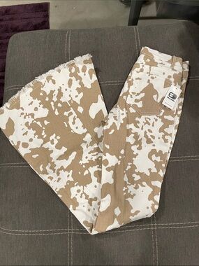 Buckle Cow Print flare jeans